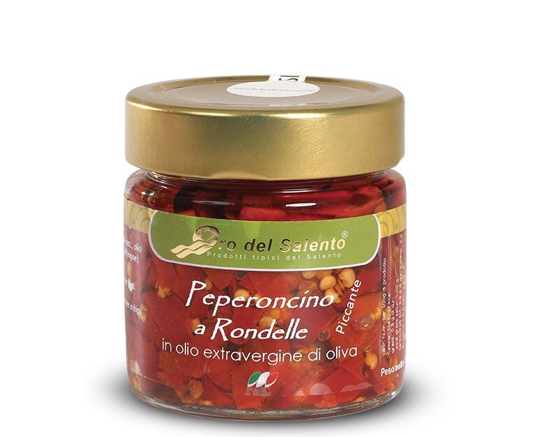 Spicy chili pepper rings in extra virgin olive oil Spicy chili pepper slices in extra virgin olive oil